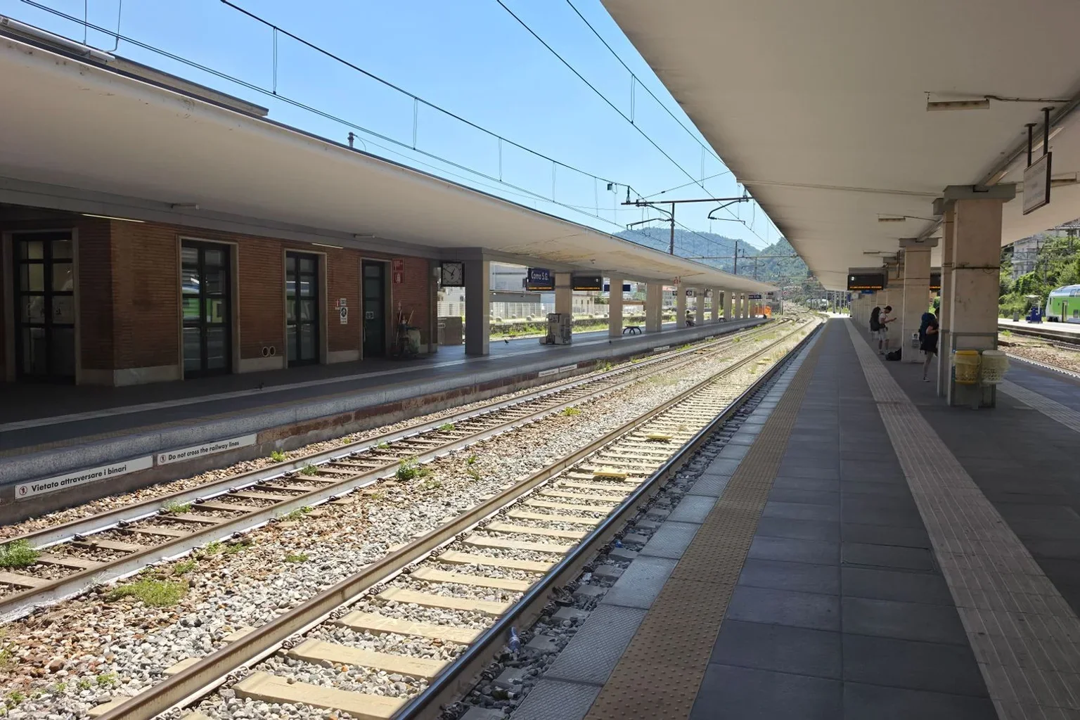 Railway platforms and tracks on a sunny day